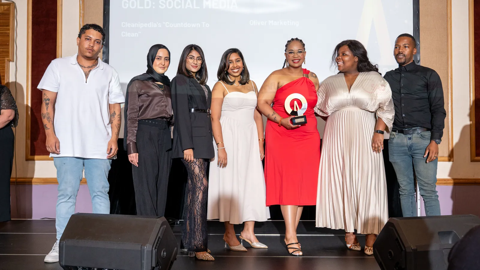 Assegai Awards 2025 winners celebrating on stage after receiving a Gold trophy